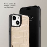 Selencia Coque de télephone Nova Croco avec cordon et porte-cartes Apple iPhone 15 - Beige