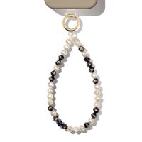 iDeal of Sweden Wristlet Strap - Moonlit Caramel Pearl